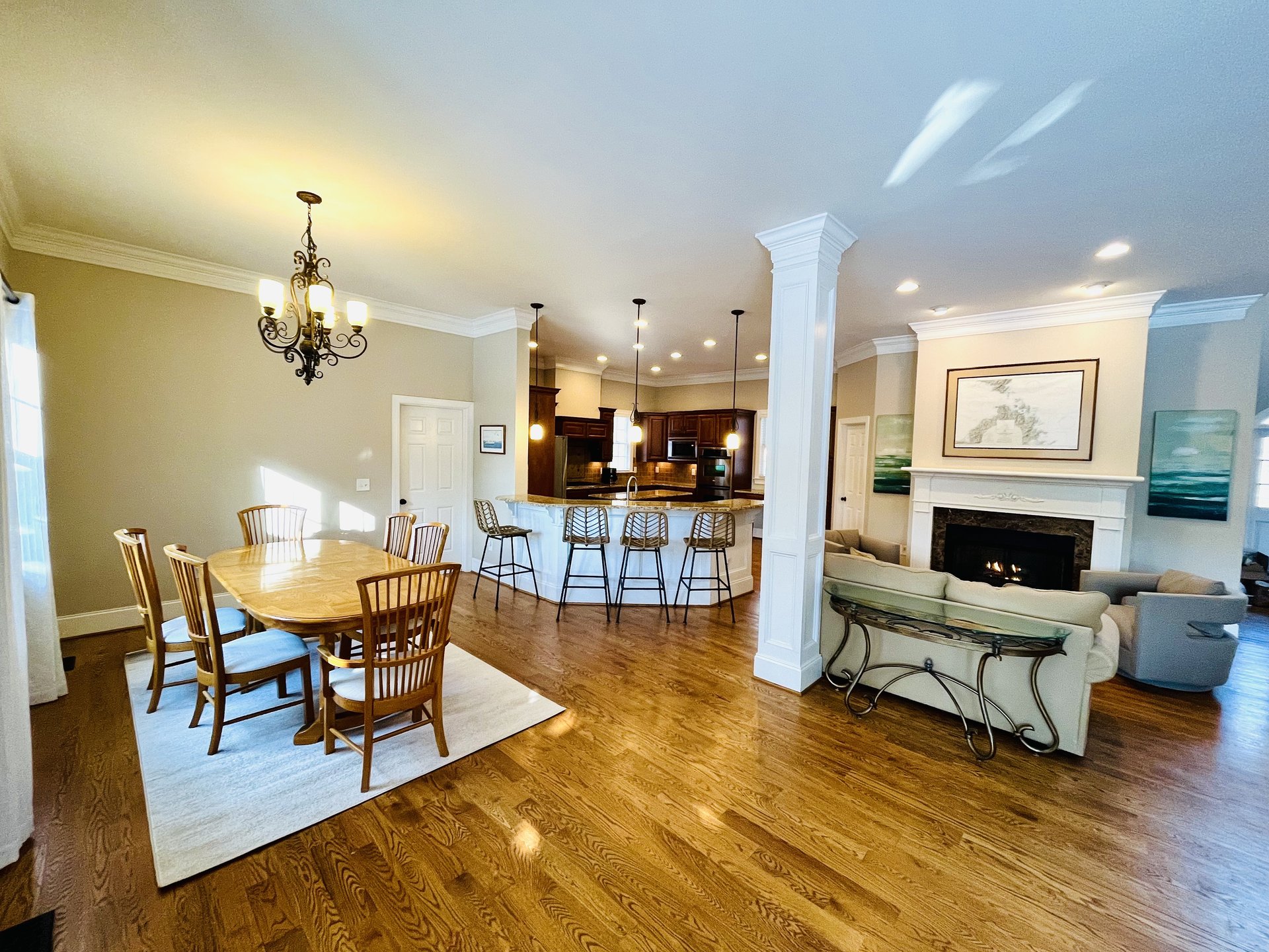 Living area with fireplace and kitchen